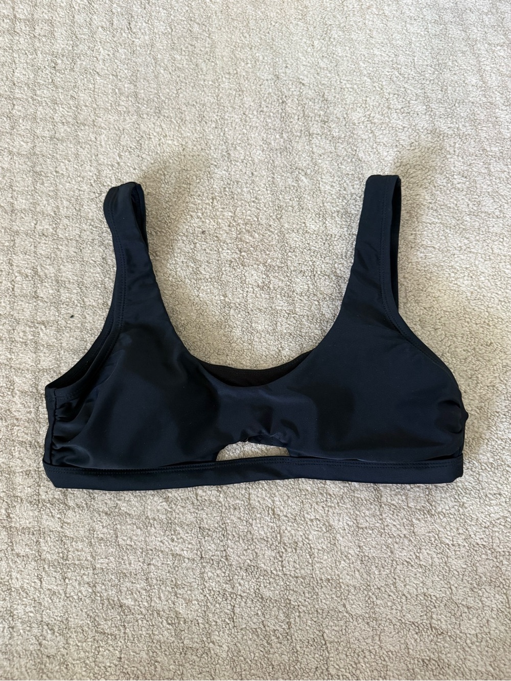 Black bikini top with cut out